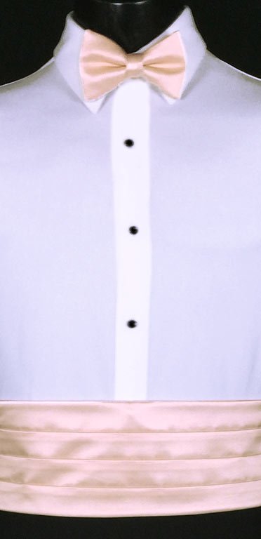 Blush Cummerbund in the simply or modern solid collection from Larr Brio shown with matching bow tie. Also available with matching pock square and suspenders.