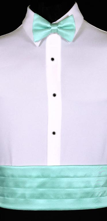 Mint Cummerbund in the simply or modern solid collection from Larr Brio shown with matching bow tie. Also available with matching pock square and suspenders.
