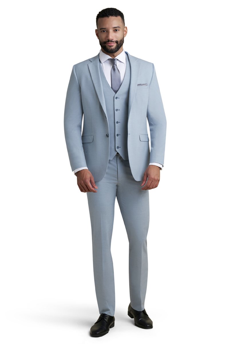 light blue stretch suit worn with a white shirt and a dusk blue tie