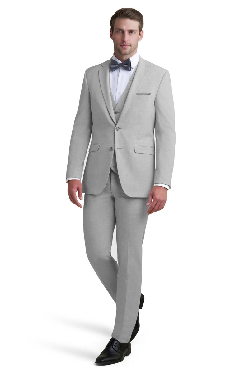 light grey stretch suit worn with a white shirt and a dusk blue bow tie
