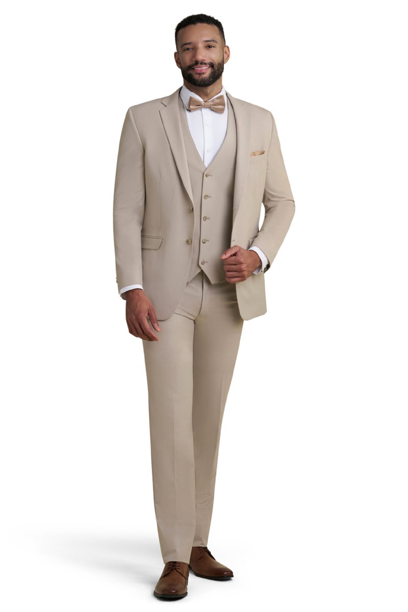 tan stretch 3 piece suit with a white shirt and a gold bow tie
